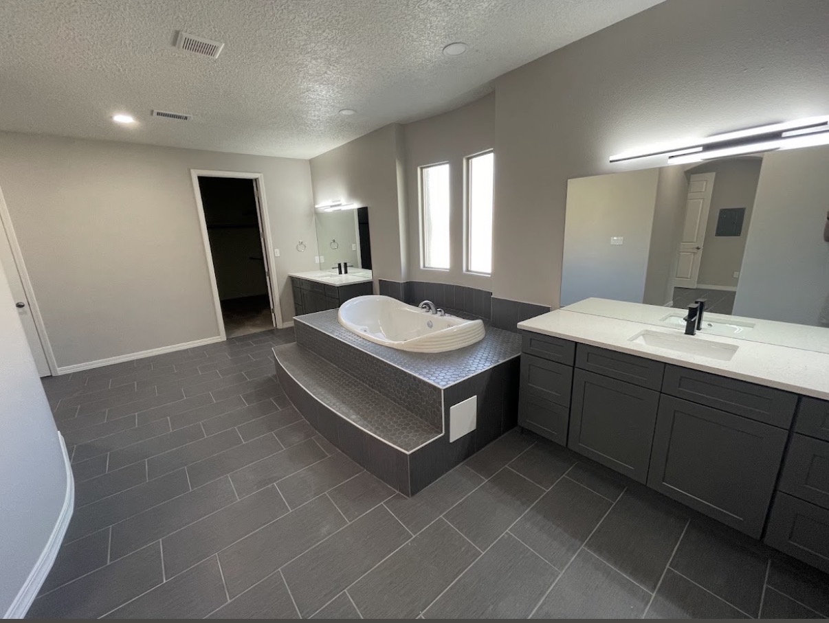 Primary bath with raised soaking tub